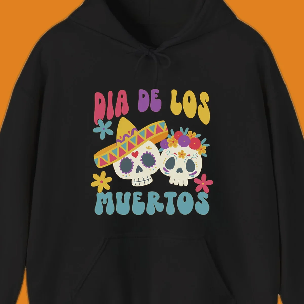 Two vibrant Dia de los Muertos sugar skulls, one wearing a sombrero and the other a flower crown, surrounded by colorful flowers and text that reads DIA DE LOS MUERTOS.