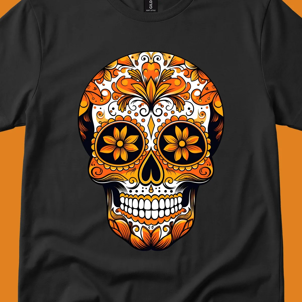 A vibrant marigold calavera skull illustration with intricate orange and yellow floral patterns on a black and white background.