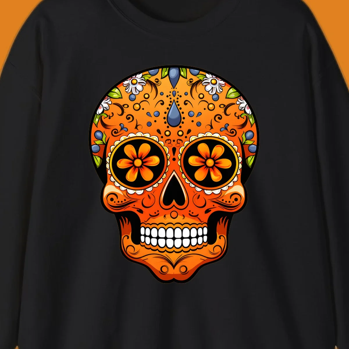A vibrant orange calavera sugar skull with blue and white flowers, green leaves, and intricate swirling patterns.