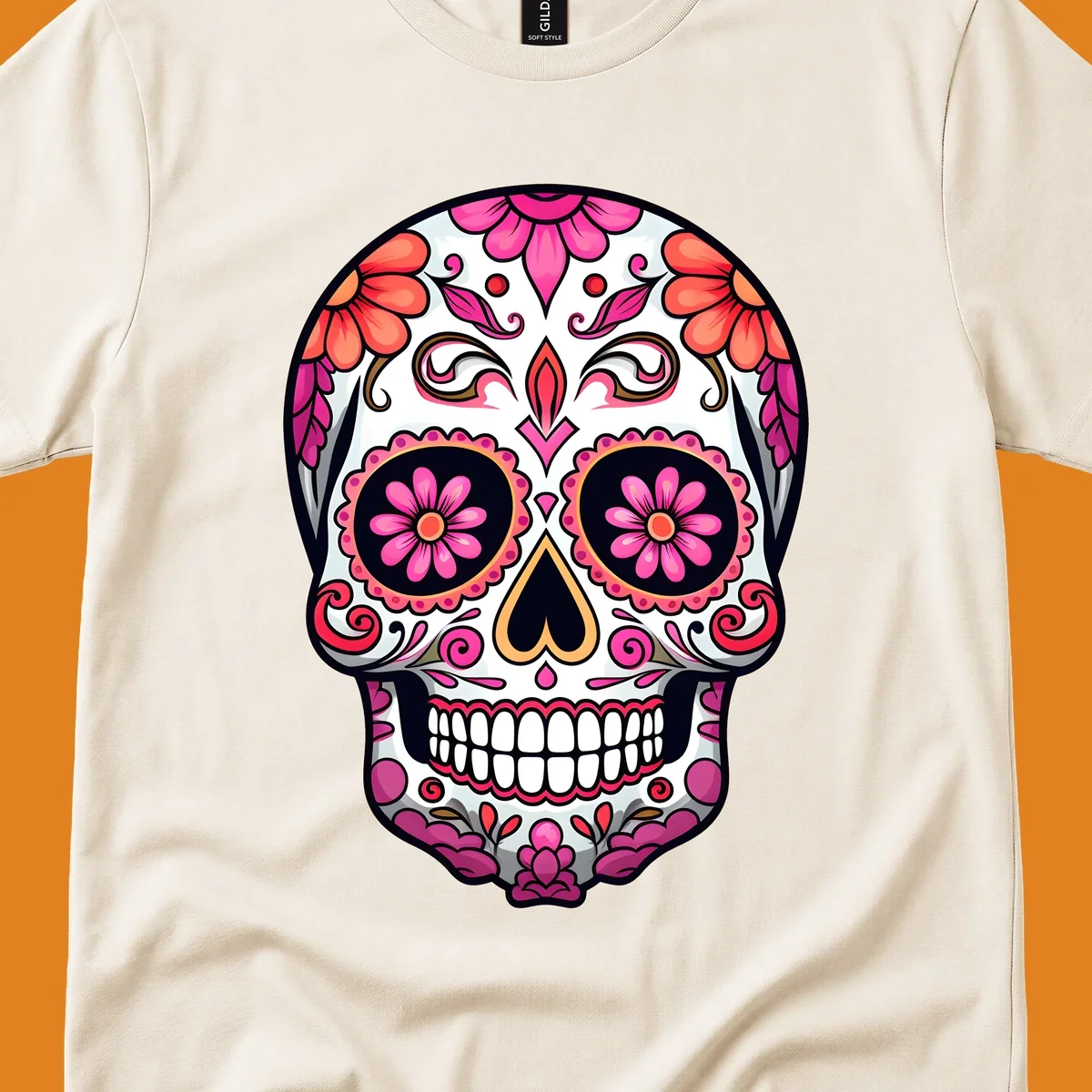 A vibrant ornate floral calavera skull with pink and coral flowers and intricate black and gold details on a white background.