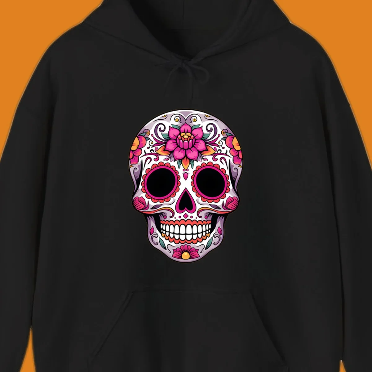 A vibrant, intricately decorated calavera sugar skull featuring pink lotus flowers, orange accents, and elegant scrollwork.