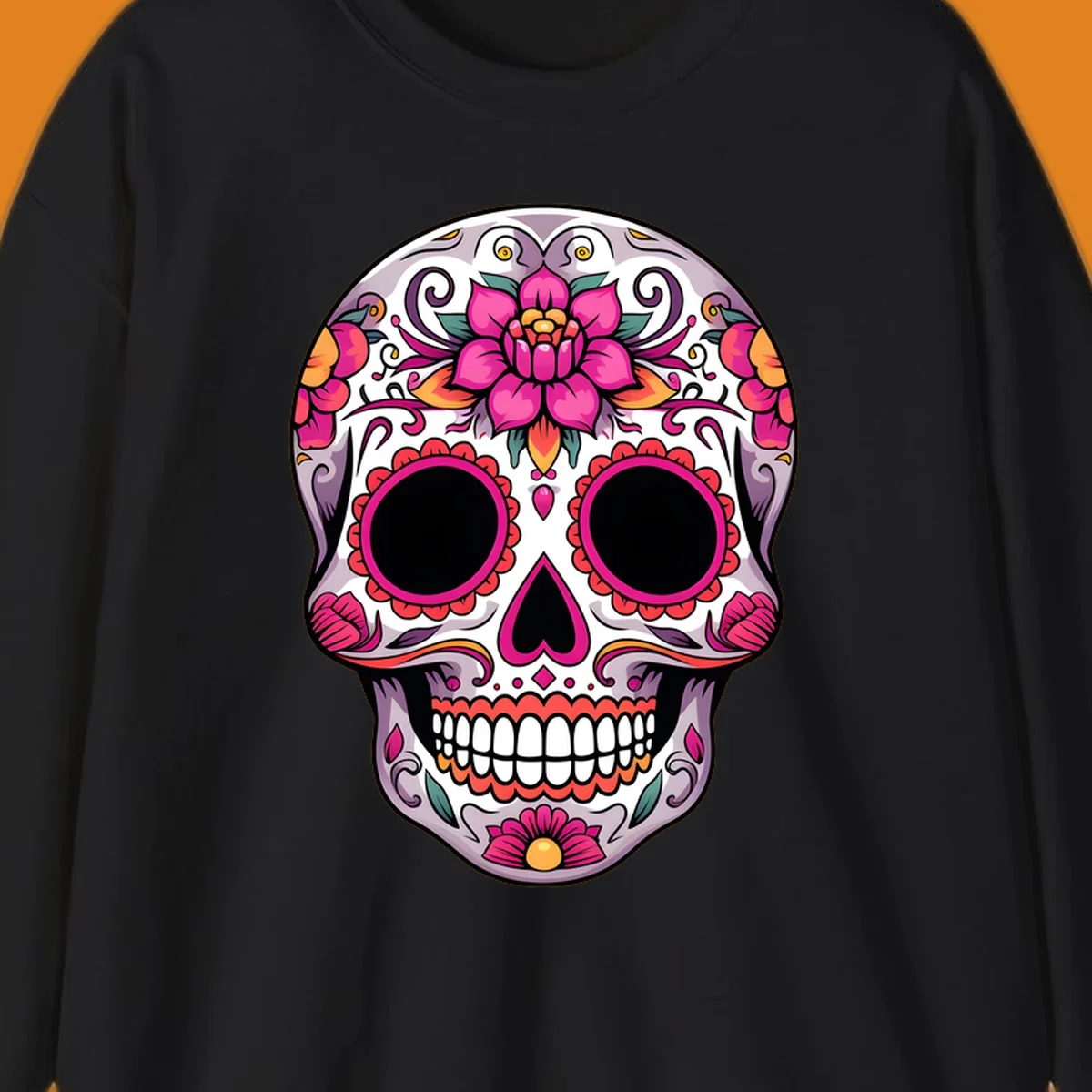 A vibrant, intricately decorated calavera sugar skull featuring pink lotus flowers, orange accents, and elegant scrollwork.