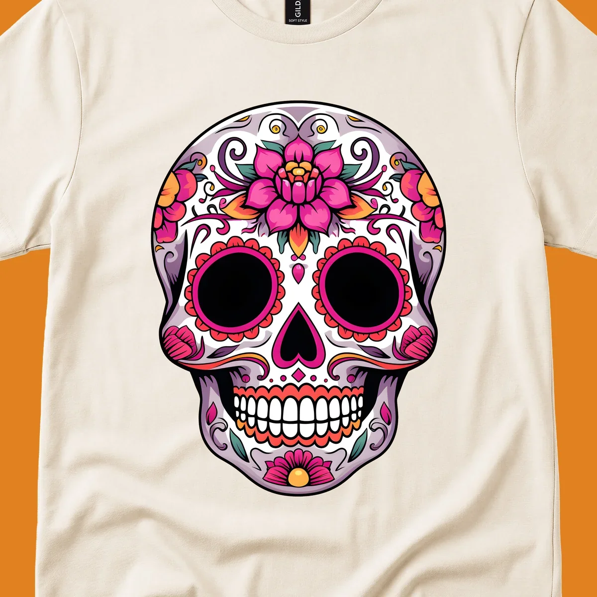 A vibrant, intricately decorated calavera sugar skull featuring pink lotus flowers, orange accents, and elegant scrollwork.