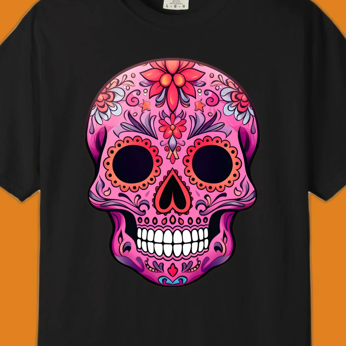 A vibrant pink calavera sugar skull design, adorned with intricate floral patterns, swirls, and stars. Features dark eye sockets, heart nose, and white teeth.