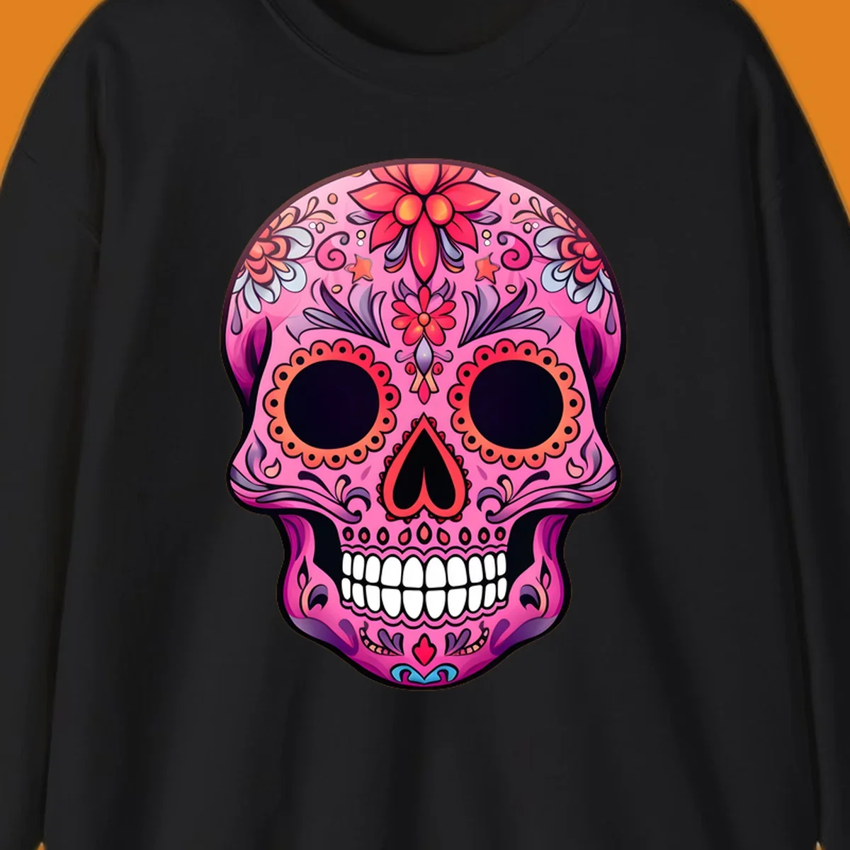 A vibrant pink calavera sugar skull design, adorned with intricate floral patterns, swirls, and stars. Features dark eye sockets, heart nose, and white teeth.