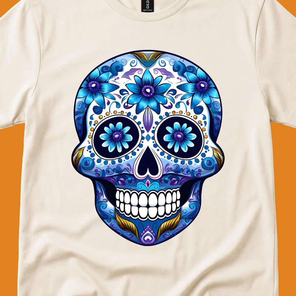 A vibrant blue floral calavera sugar skull illustration with intricate patterns, white teeth, and gold accents.