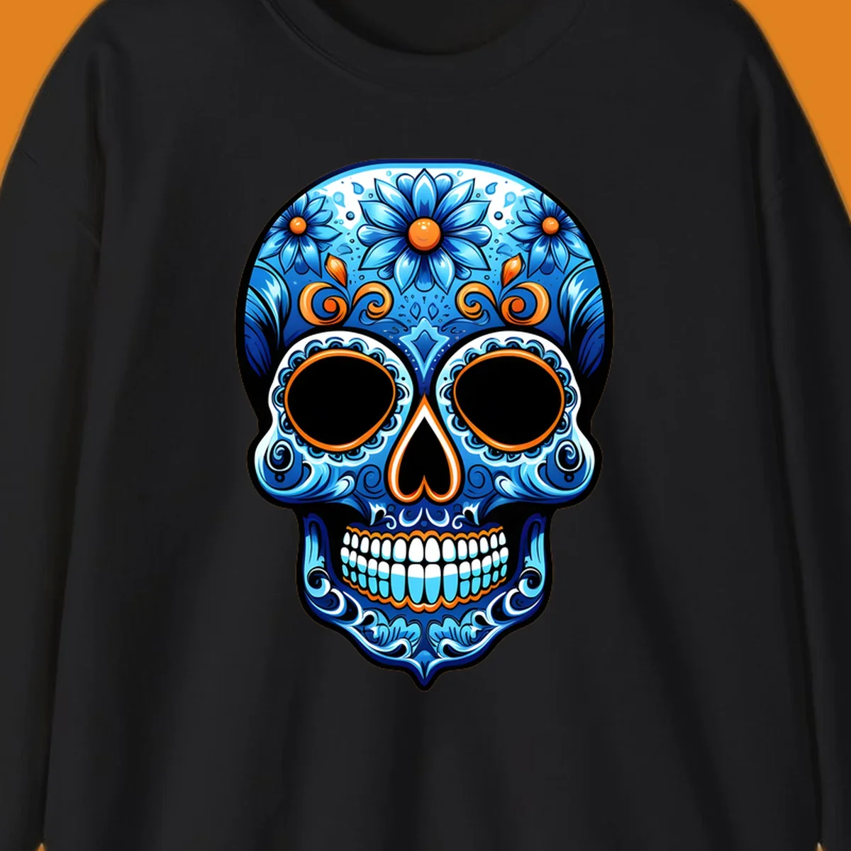 An ornate vibrant floral calavera skull illustration featuring shades of blue, orange accents, and intricate patterns.