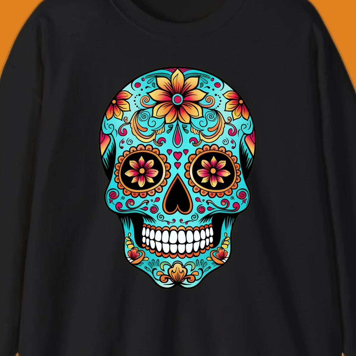 A vibrant, ornate floral calavera sugar skull illustration in teal, orange, gold, and pink on a black background.