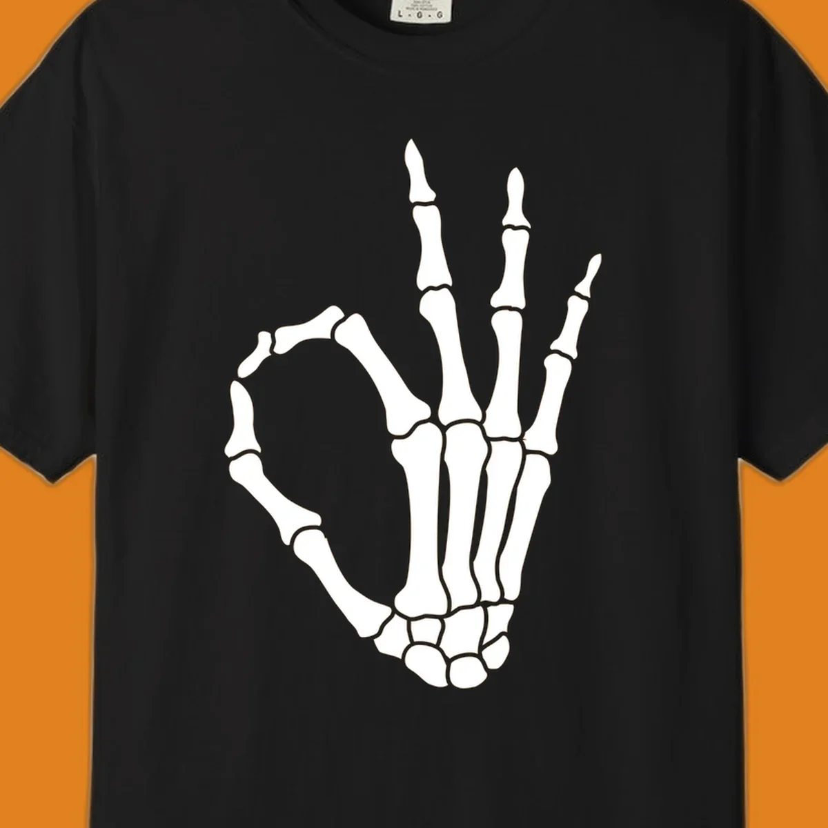 A white skeleton hand forms the 'okay' sign, with thumb and index finger creating a circle. A minimalist skeleton-hand-okay-sign.