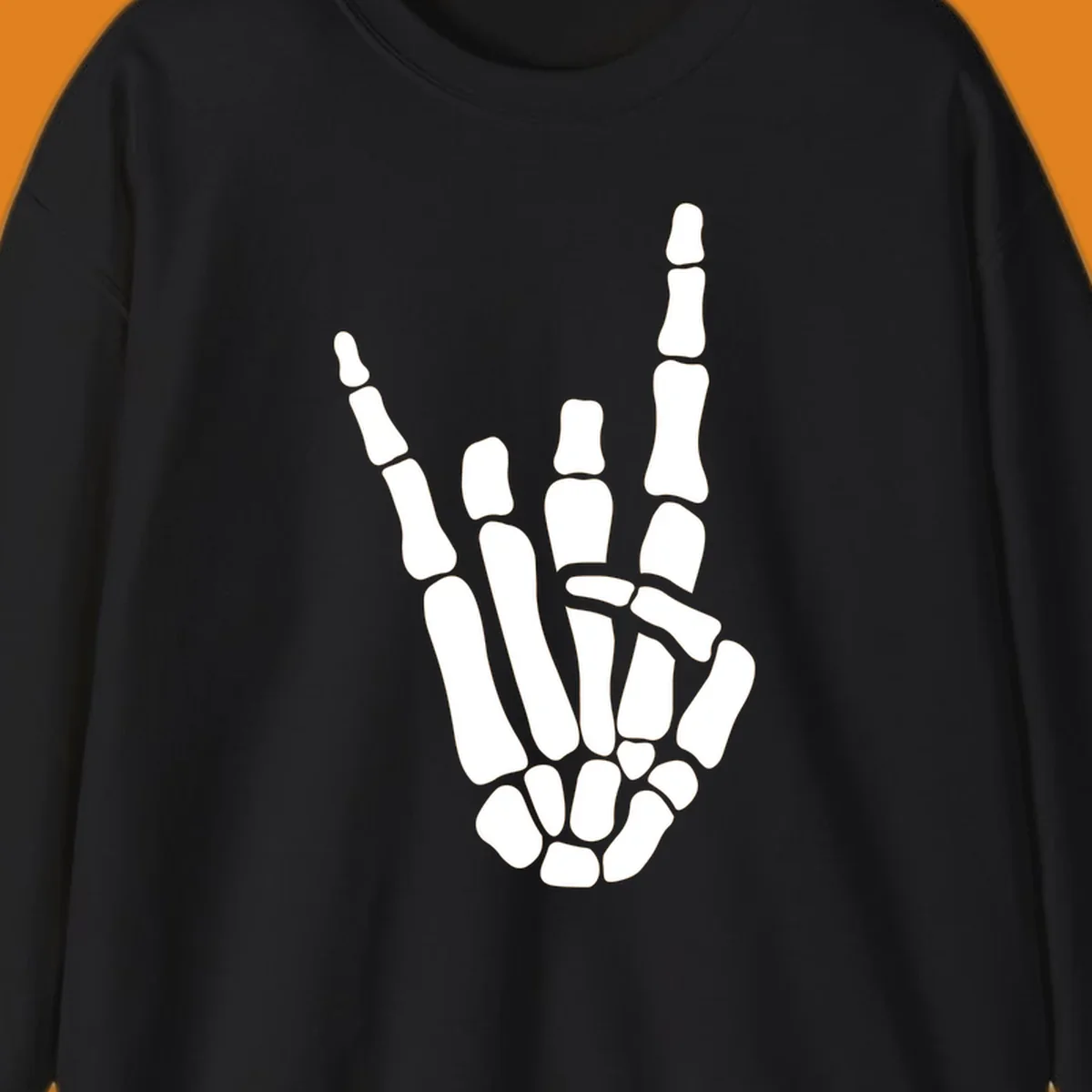 An illustration of a skeleton hand making the rock-on-skeleton-gesture, with index and pinky fingers extended.
