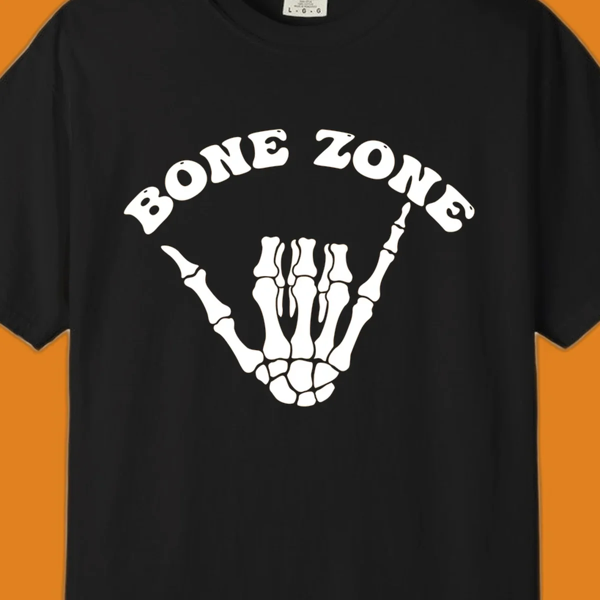A white skeleton hand making a shaka sign with the arched text BONE ZONE above it, representing the bone-zone-shaka-skeleton concept.