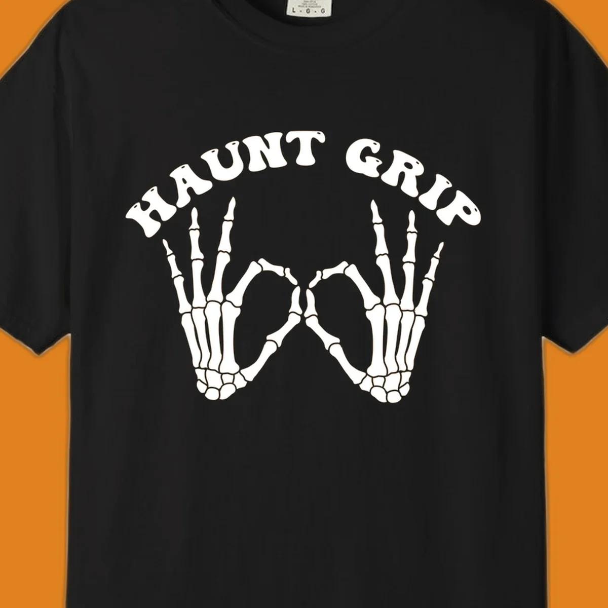 A graphic featuring two skeleton hands forming a heart shape, with 'HAUNT GRIP' text above, embodying the haunt-grip-skeleton-hands-heart theme.