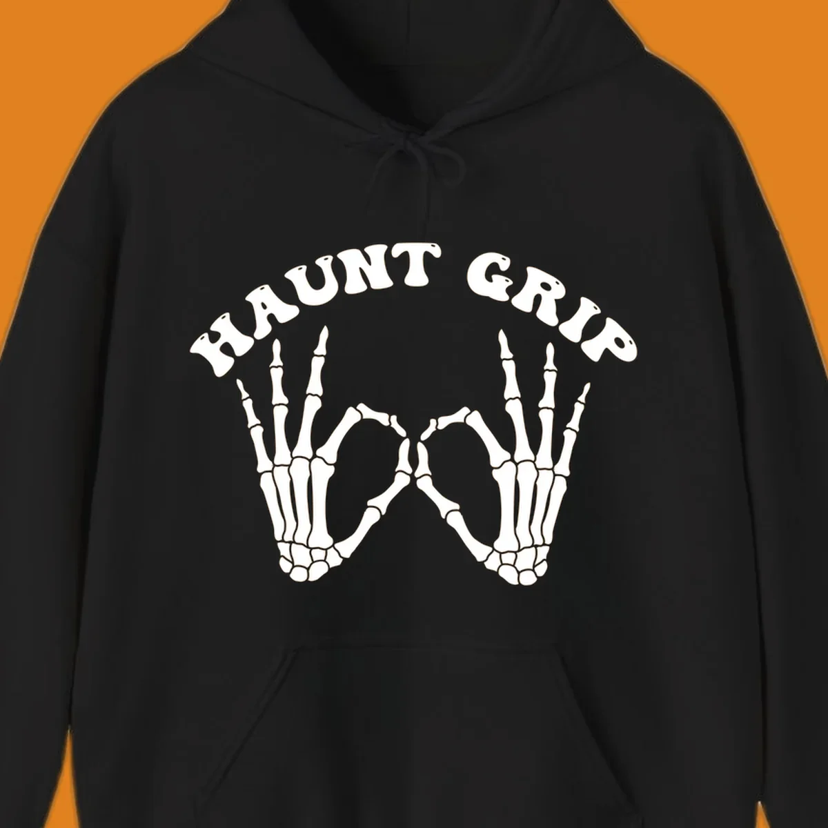 A graphic featuring two skeleton hands forming a heart shape, with 'HAUNT GRIP' text above, embodying the haunt-grip-skeleton-hands-heart theme.