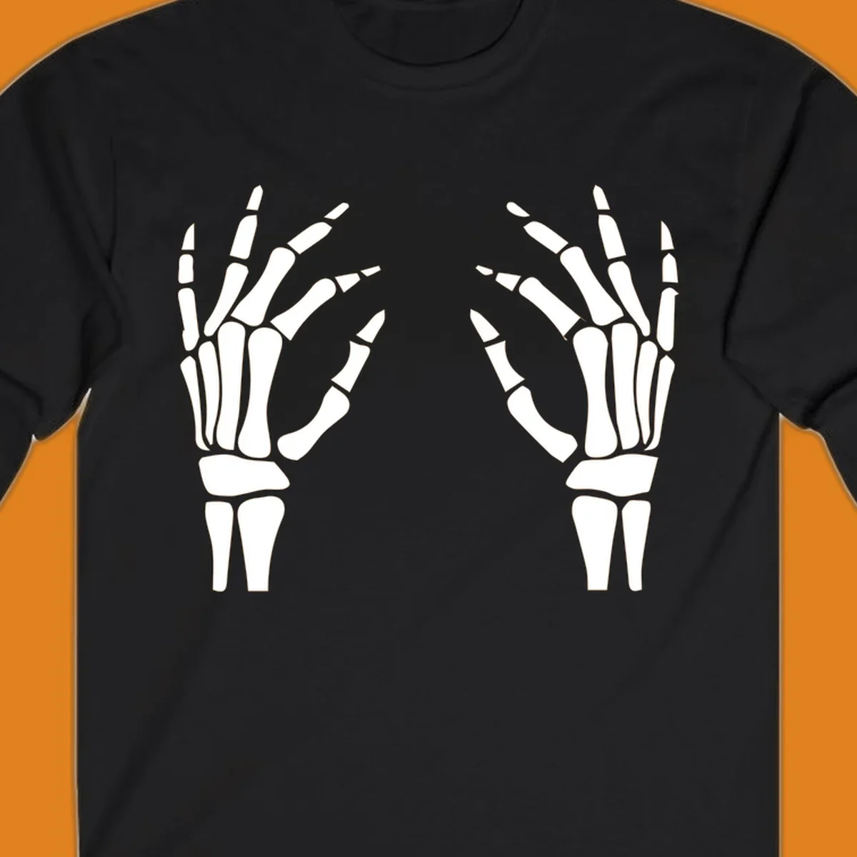 A pair of white skeletal hands reaching inwards on a dark background, illustrating the pair-skeletal-hands concept.