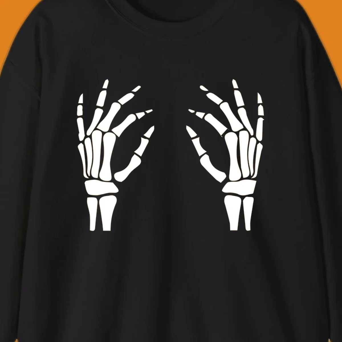 A pair of white skeletal hands reaching inwards on a dark background, illustrating the pair-skeletal-hands concept.