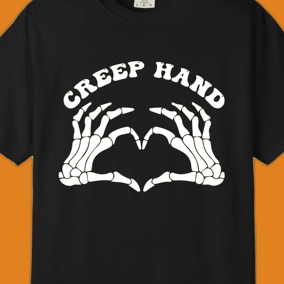 A white creep-hand-skeleton-heart design with two skeleton hands forming a heart shape below the arched text 'CREEP HAND'.