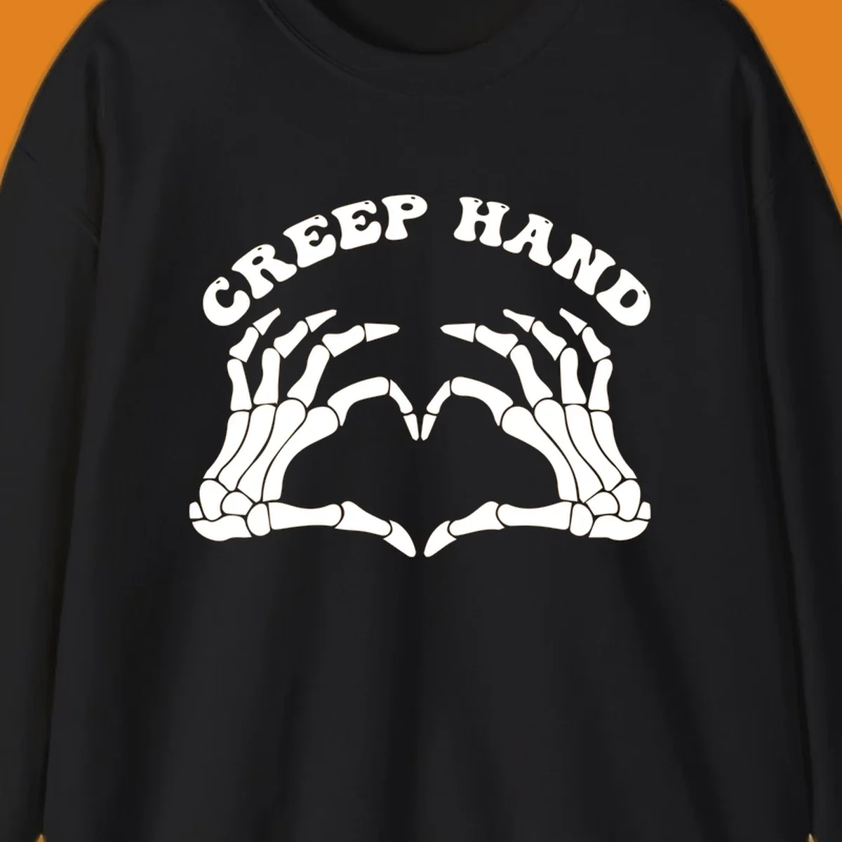 A white creep-hand-skeleton-heart design with two skeleton hands forming a heart shape below the arched text 'CREEP HAND'.