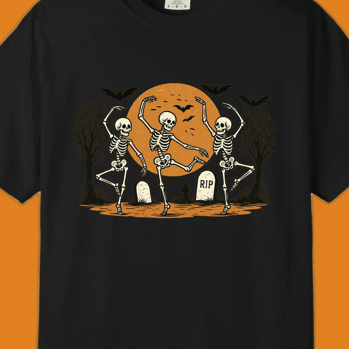 Dancing skeletons Halloween design with a full moon, bats, and gravestones.