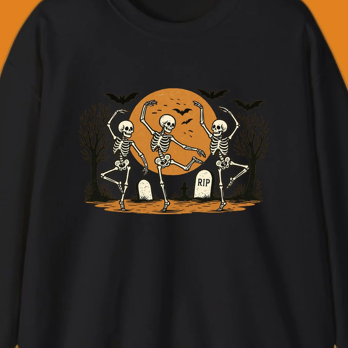 Dancing skeletons Halloween design with a full moon, bats, and gravestones.