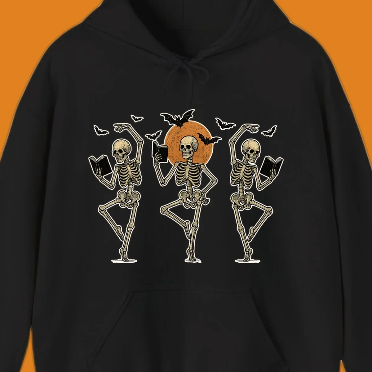 Dancing skeletons reading books under a moon with bats, skeleton-book-dance design.