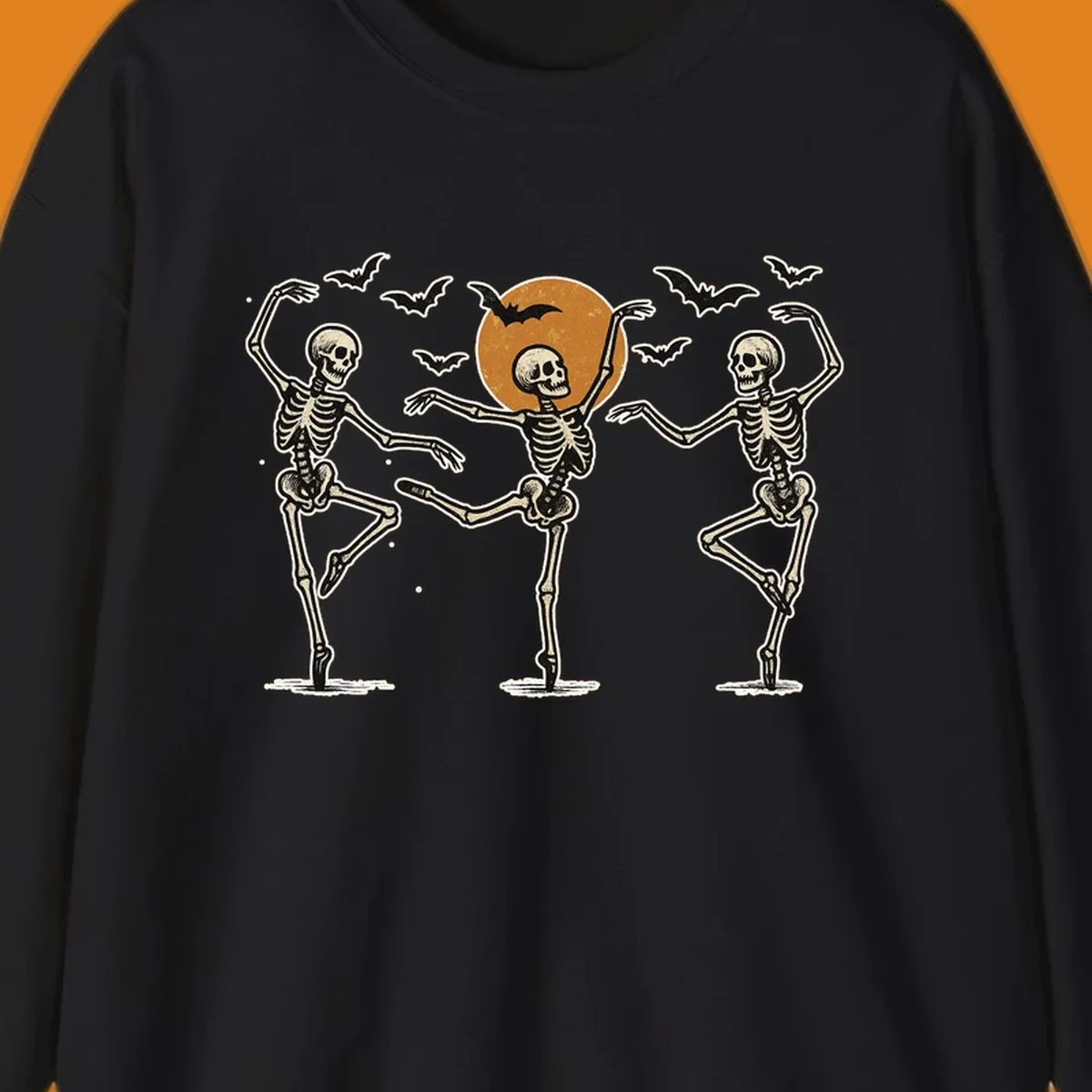 Vintage illustration of three dancing skeletons under a Halloween moon with bats, evoking a spooky ballet.