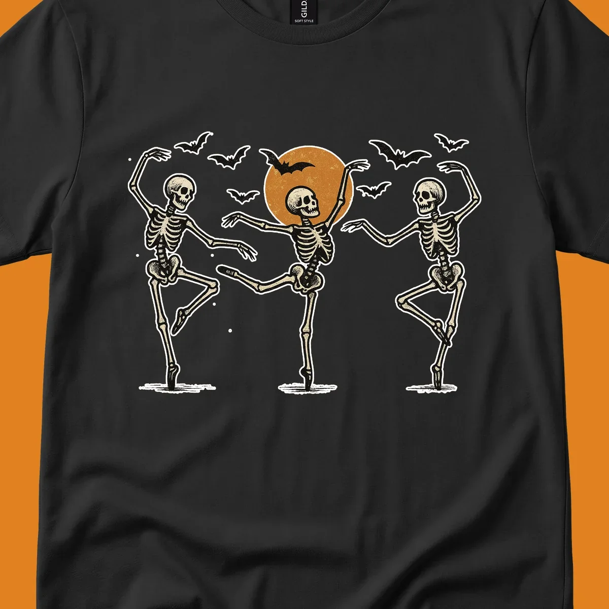 Vintage illustration of three dancing skeletons under a Halloween moon with bats, evoking a spooky ballet.
