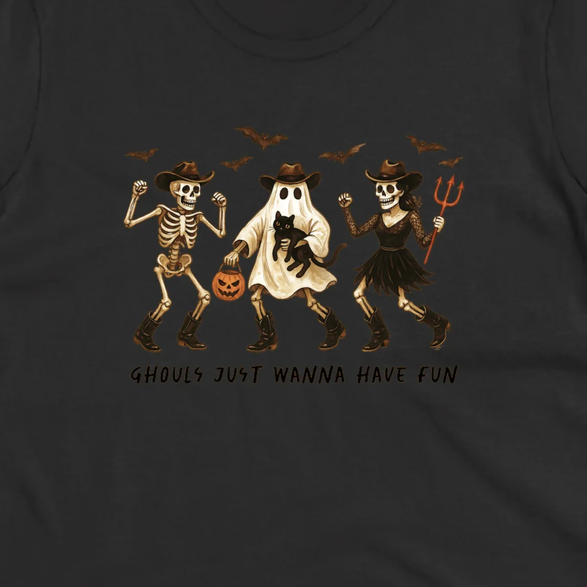 Halloween cowboy skeletons and ghost dancing with a cat and pumpkin, text reads Ghouls Just Wanna Have Fun.