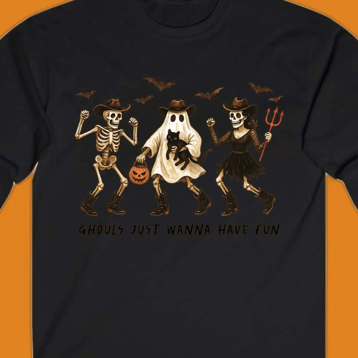 Halloween cowboy skeletons and ghost dancing with a cat and pumpkin, text reads Ghouls Just Wanna Have Fun.