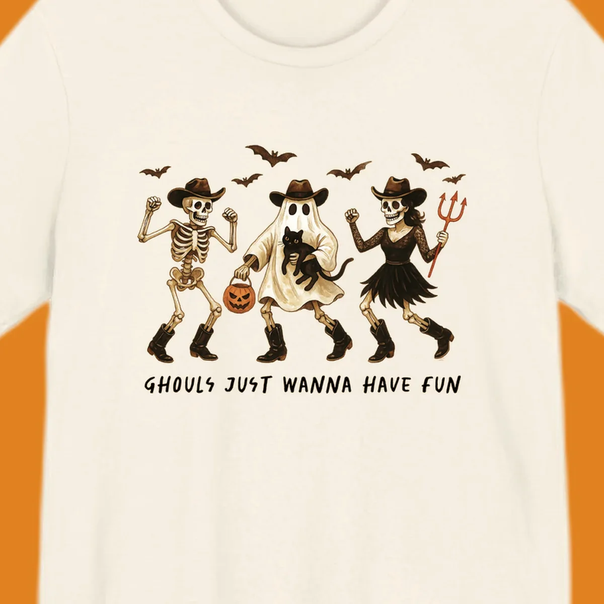 Halloween cowboy skeletons and ghost dancing with a cat and pumpkin, text reads Ghouls Just Wanna Have Fun.