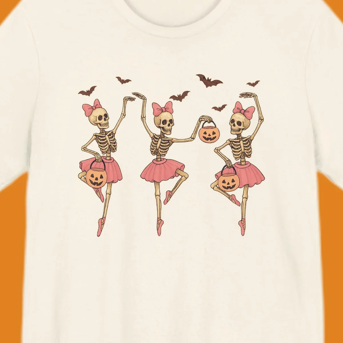 Skeleton ballerinas in tutus with pumpkins and bats, perfect for Halloween.