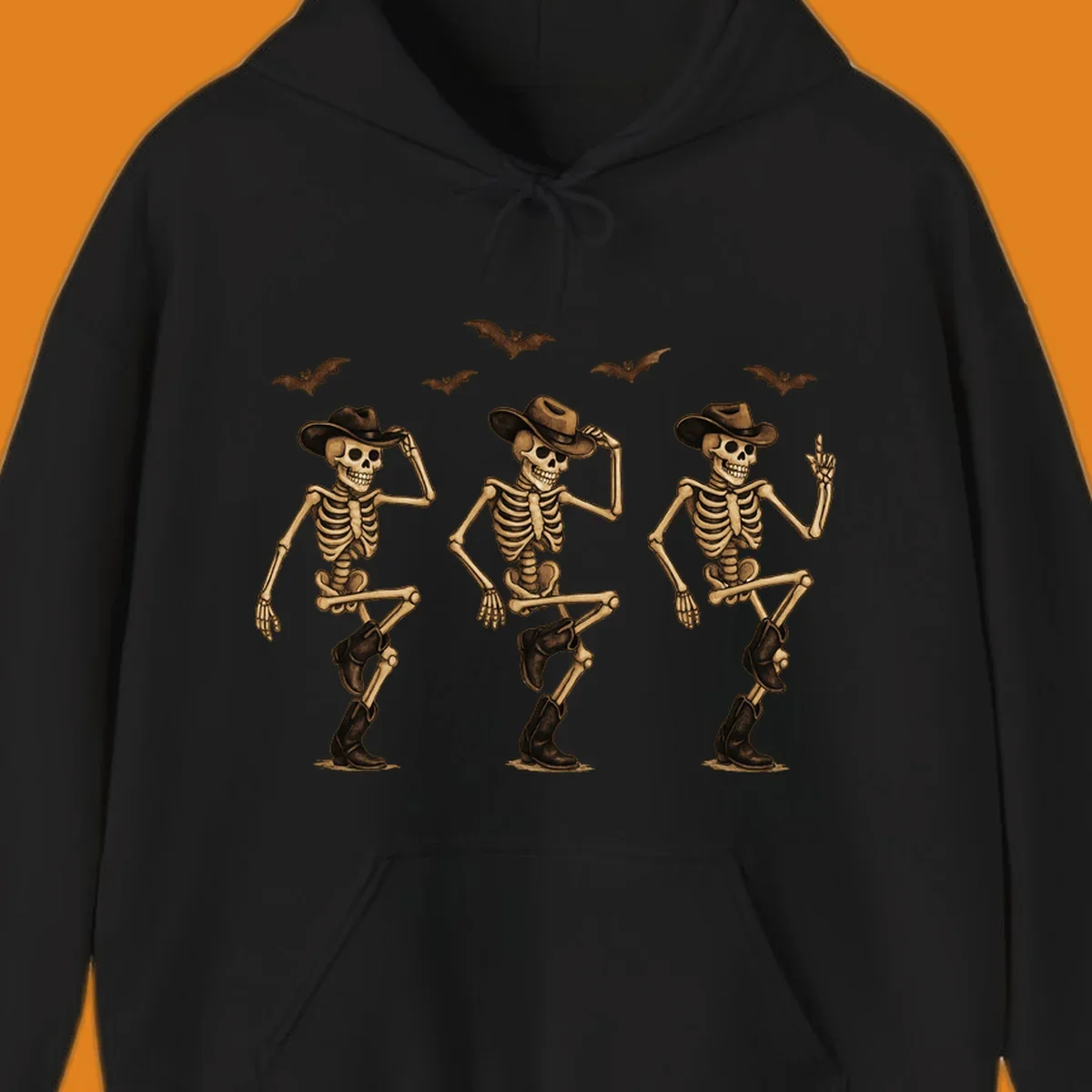 Dancing cowboy skeletons with bats, vintage Halloween graphic.