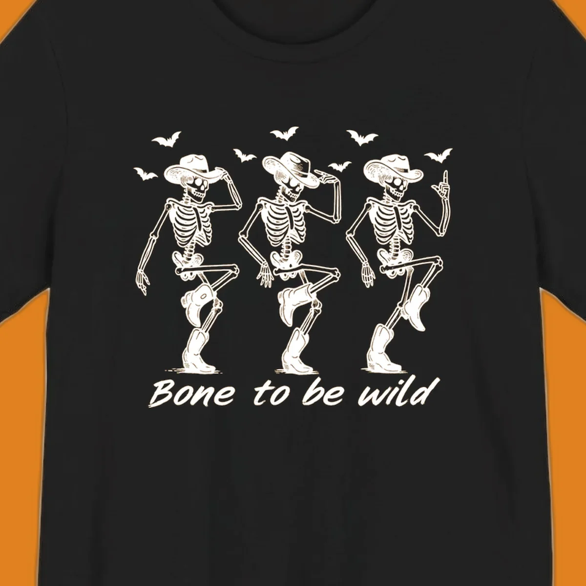 Three dancing skeletons in cowboy hats and boots with bats and the phrase 'Bone to be wild', bone-to-be-wild-cowboy