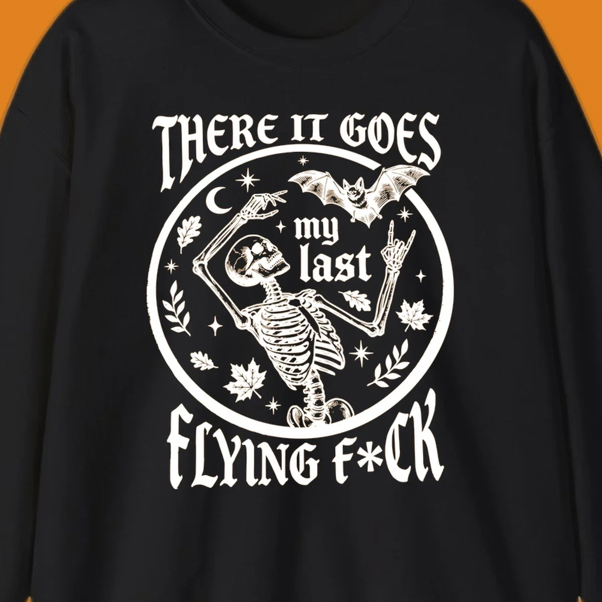 Skeleton with bat and moon, 'There It Goes My Last Flying Fuck' text, gothic illustration. flying-fuck-skeleton