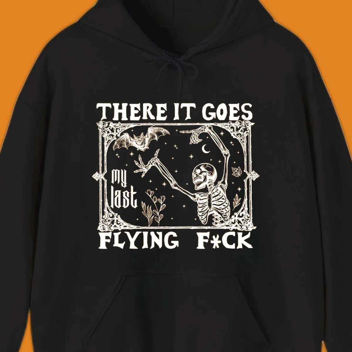 Skeleton reaching for a bat with text 'There It Goes My Last Flying F*ck', dark humor design.