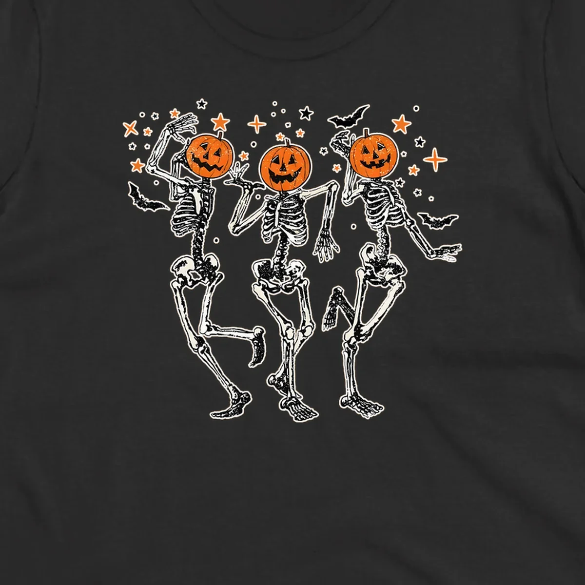 Dancing skeletons with pumpkin heads, bats, and stars illustration for Halloween.