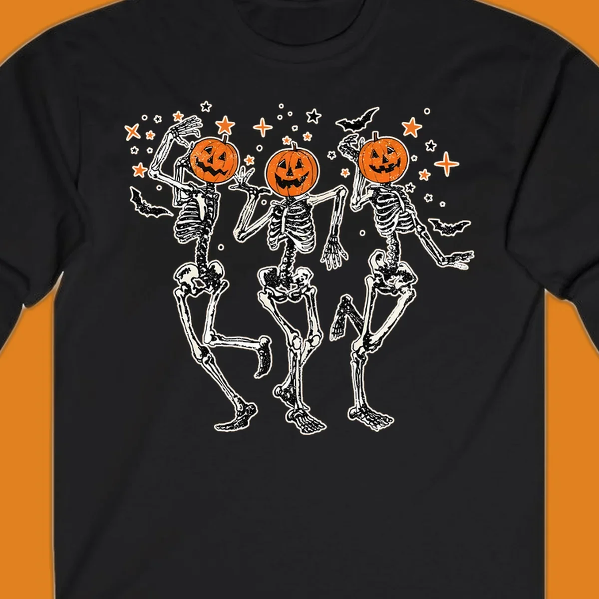 Dancing skeletons with pumpkin heads, bats, and stars illustration for Halloween.