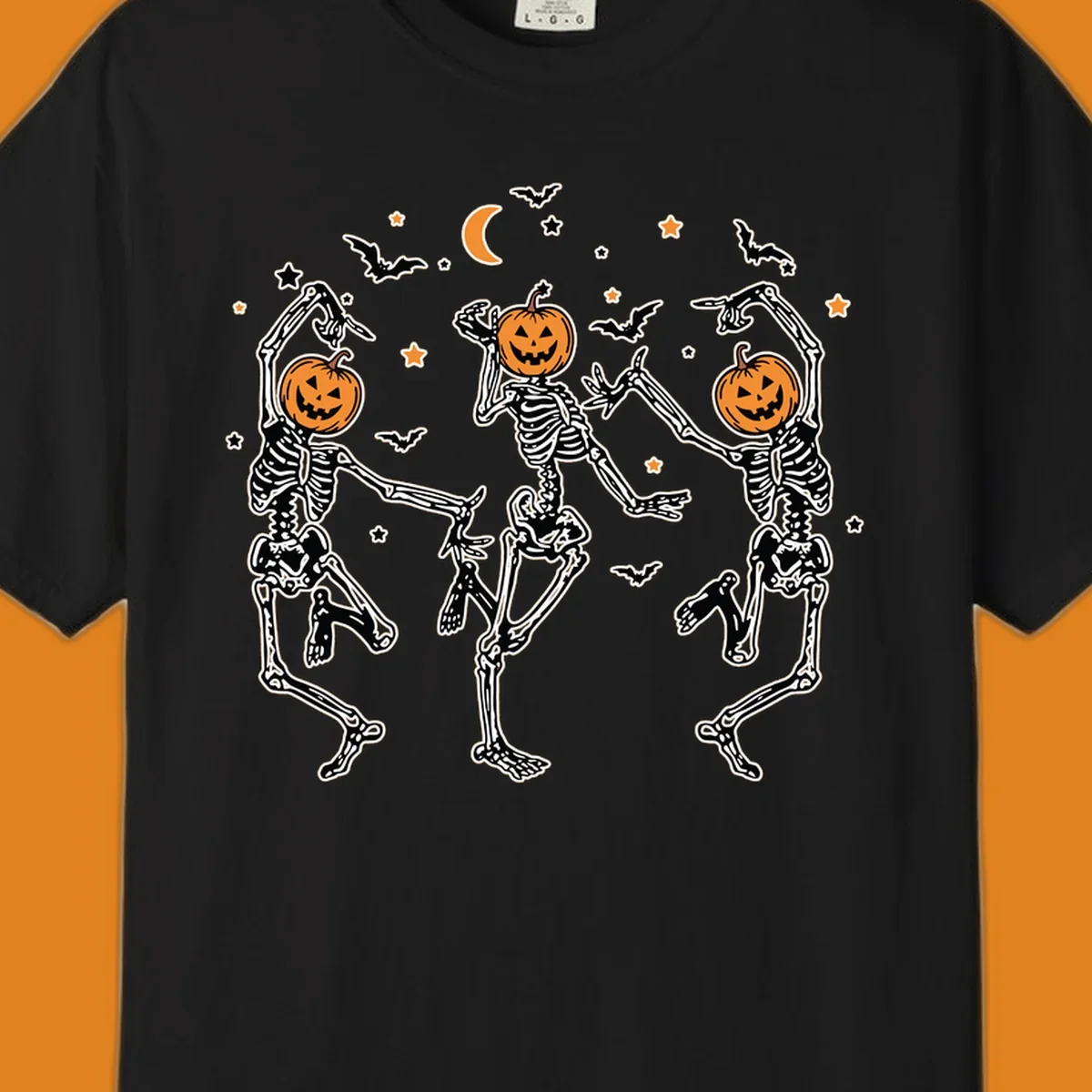 Three dancing skeletons with pumpkin heads, bats, moon, and stars illustration for Halloween.