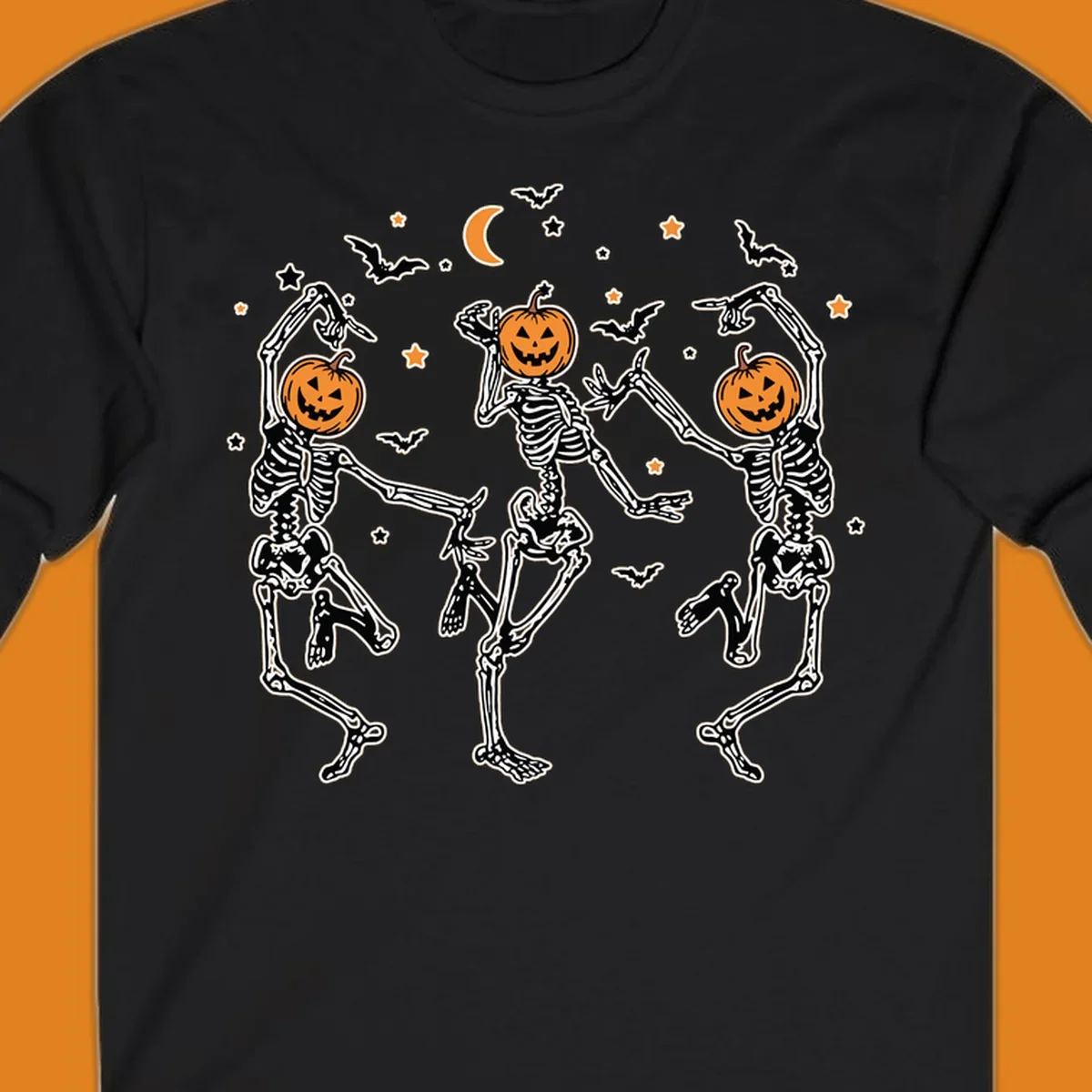Three dancing skeletons with pumpkin heads, bats, moon, and stars illustration for Halloween.