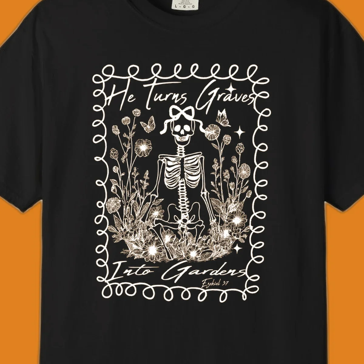 Skeleton surrounded by flowers and butterflies, text reads 'He Turns Graves Into Gardens', graves-into-gardens concept.