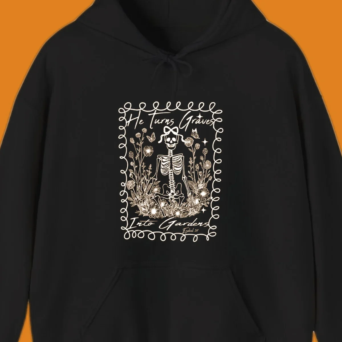 Skeleton surrounded by flowers and butterflies, text reads 'He Turns Graves Into Gardens', graves-into-gardens concept.