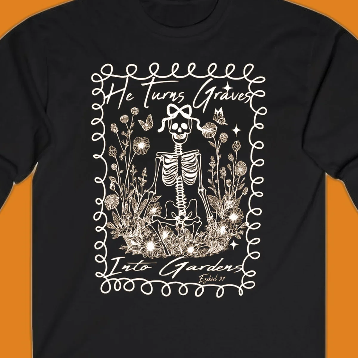 Skeleton surrounded by flowers and butterflies, text reads 'He Turns Graves Into Gardens', graves-into-gardens concept.