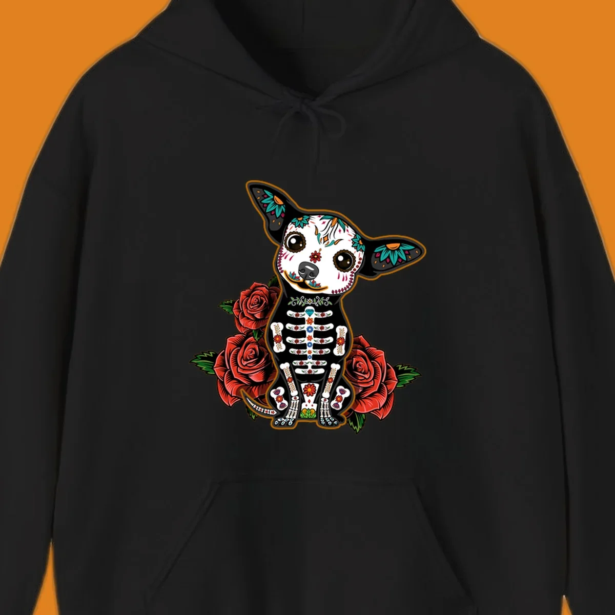 A Día de los Muertos chihuahua dog, adorned with a sugar skull face and skeleton body, sitting among red roses.