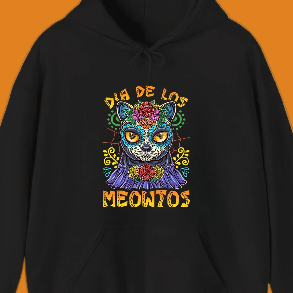 A vibrant illustration of a black cat with a sugar skull face and flowers, with the text 'DIA DE LOS MEOWTOS'. Depicts the dia-de-los-meowtos-cat concept.