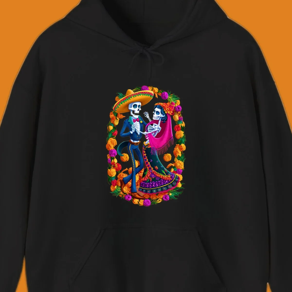 A vibrant illustration of a calavera couple dancing, framed by a colorful marigold wreath, celebrating Day of the Dead.