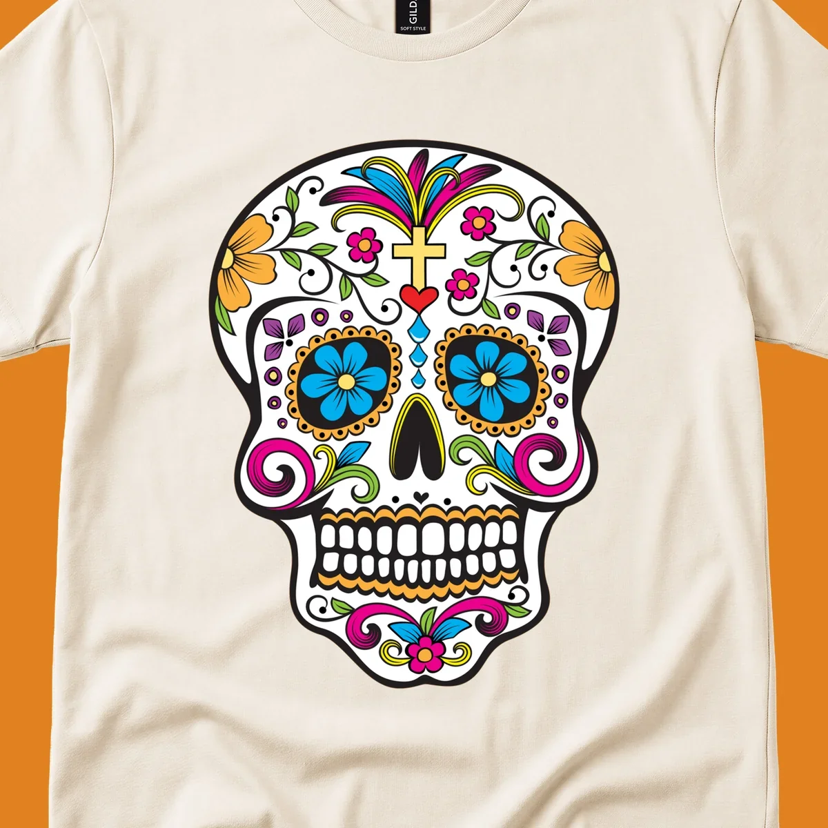 A vibrant sugar skull calavera illustration with colorful flowers, green leaves, a golden cross, and blue tears.