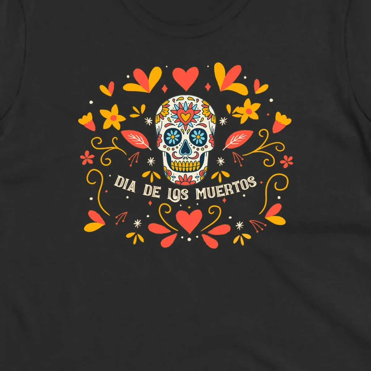 A colorful Día de los Muertos sugar skull with a heart on its forehead, surrounded by a symmetrical frame of red hearts, yellow flowers, and leaves, with 'DIA DE LOS MUERTOS' text below.