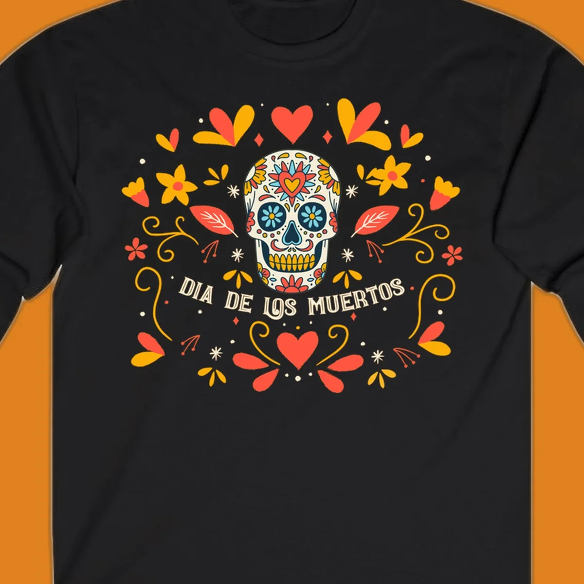A colorful Día de los Muertos sugar skull with a heart on its forehead, surrounded by a symmetrical frame of red hearts, yellow flowers, and leaves, with 'DIA DE LOS MUERTOS' text below.