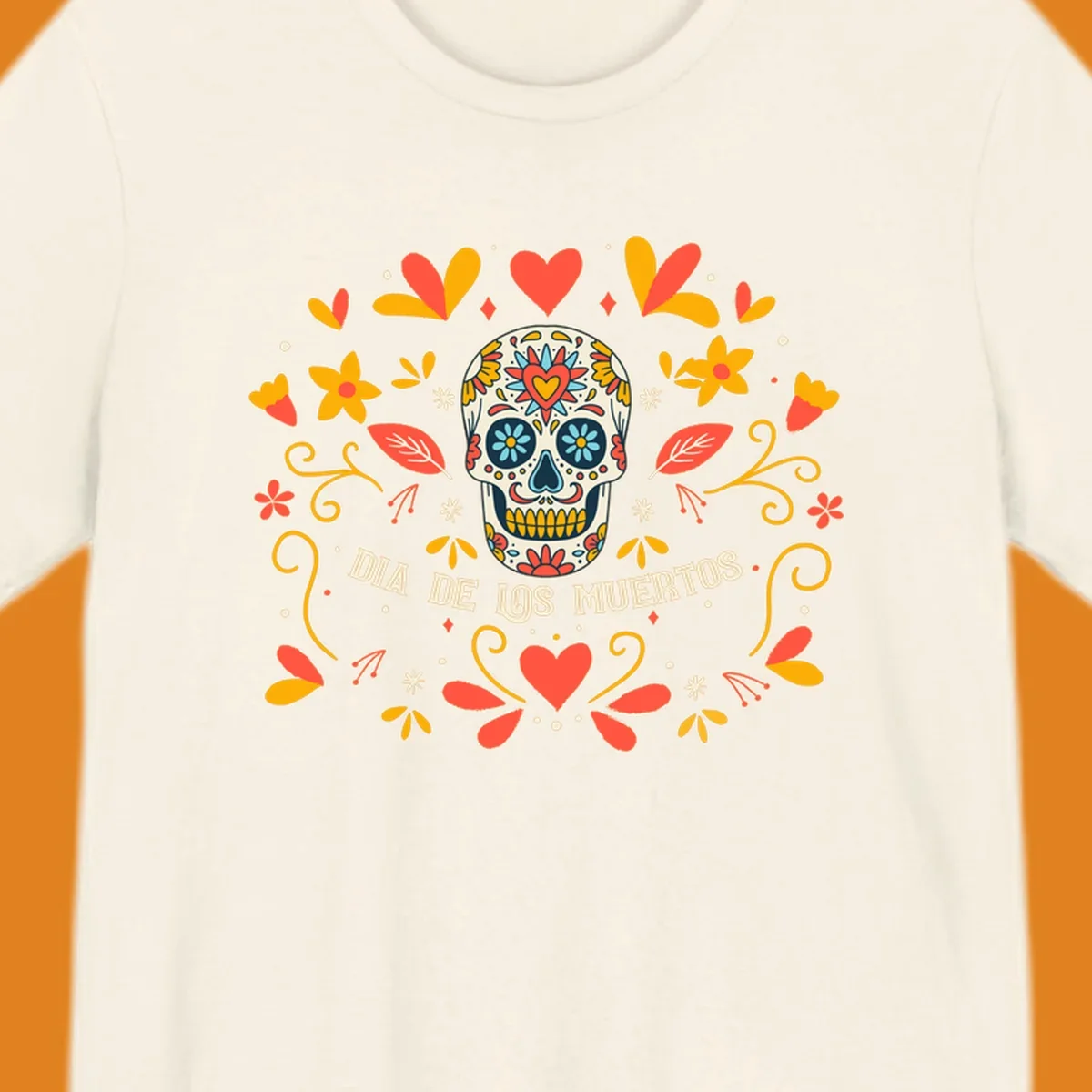 A colorful Día de los Muertos sugar skull with a heart on its forehead, surrounded by a symmetrical frame of red hearts, yellow flowers, and leaves, with 'DIA DE LOS MUERTOS' text below.