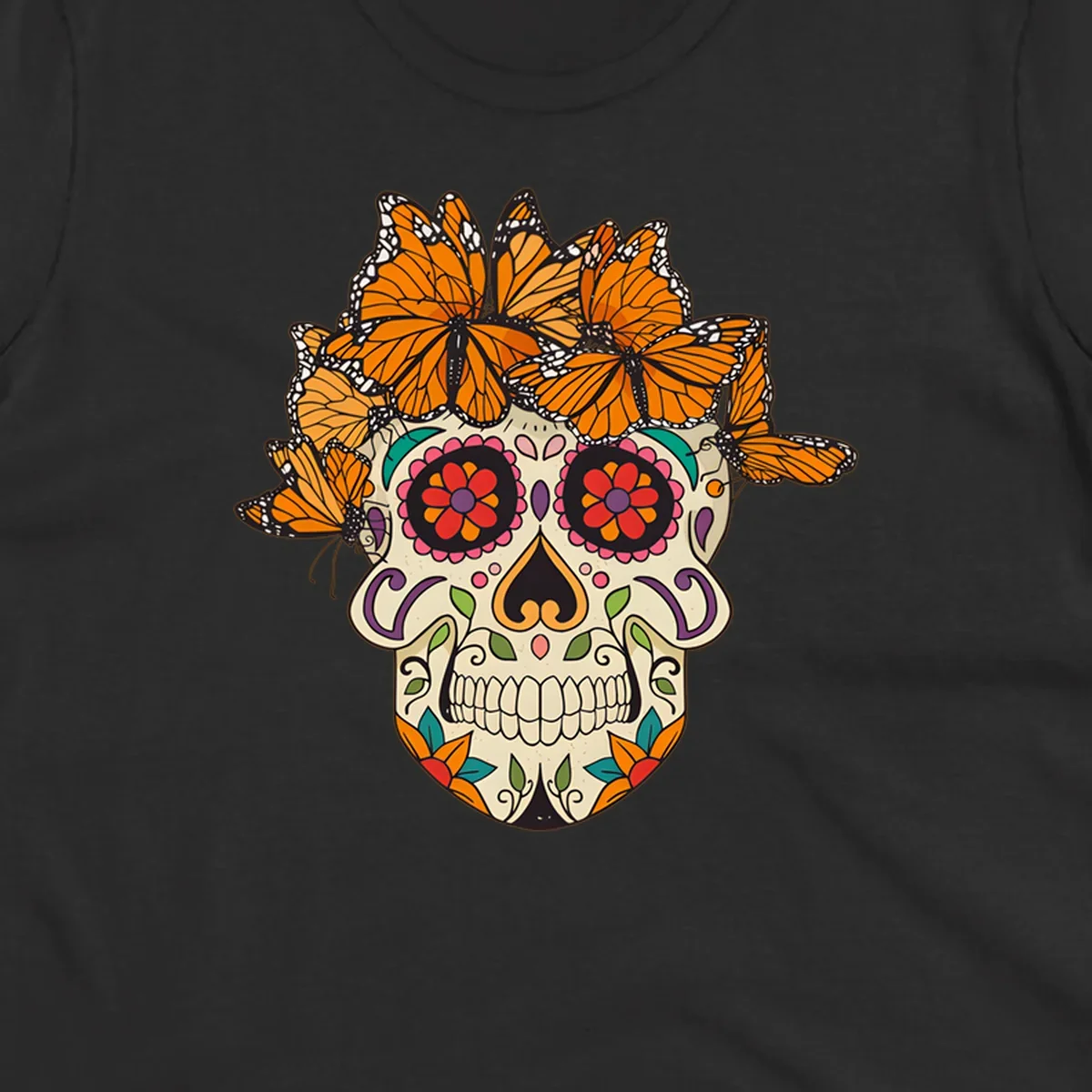 A cream sugar skull with colorful floral patterns and a crown of orange and black monarch butterflies.
