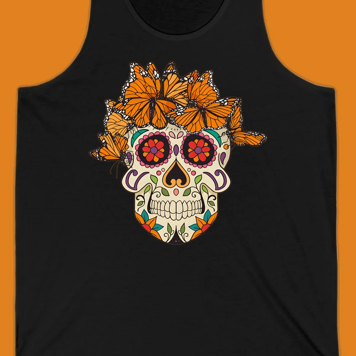 A cream sugar skull with colorful floral patterns and a crown of orange and black monarch butterflies.